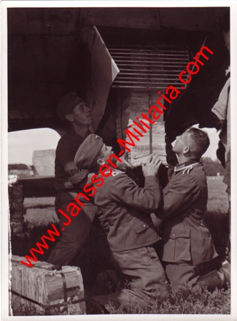 War reporter photo Luftwaffe He111 dropping leaflets Charkow