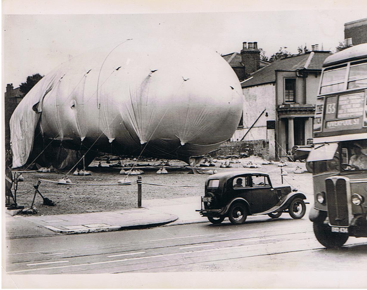 Press photo barrage balloon in London 1939