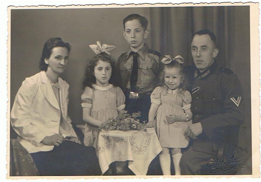 Large family photo with son in HJ uniform and father Obergefreiter Heer